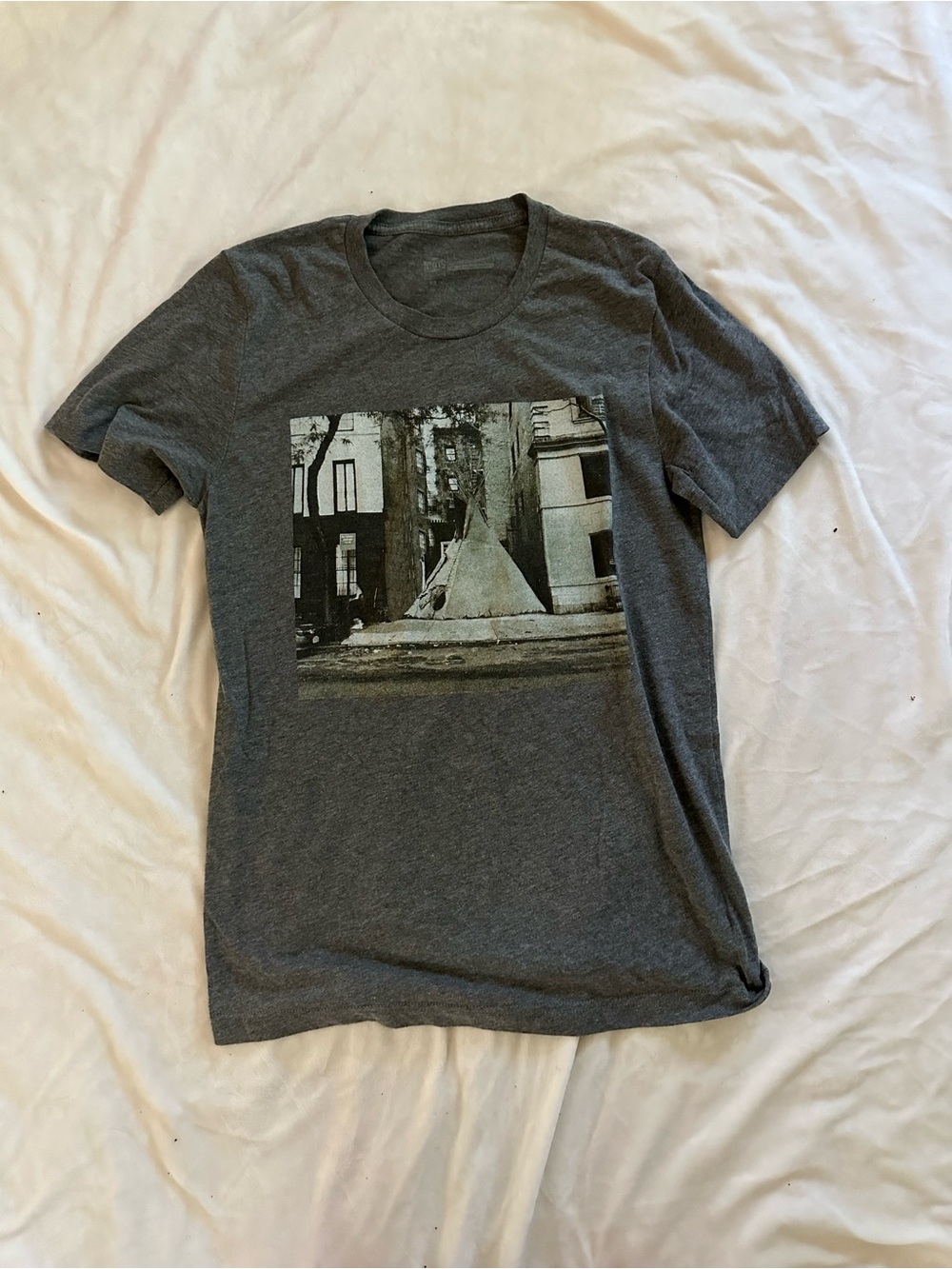 The NTVS Charcoal Gray Short Sleeve Tee with Cityscape Graphic